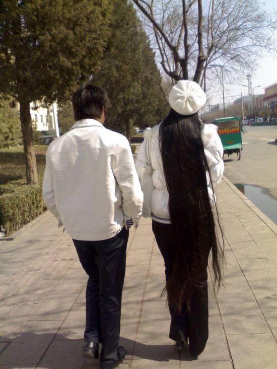 Super long hair dressed in white cloth