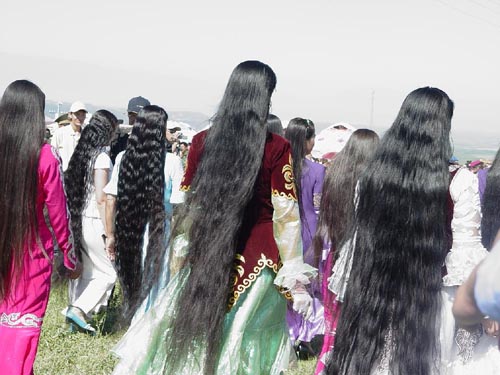 Ladies show long hair in Sinkiang travell festival