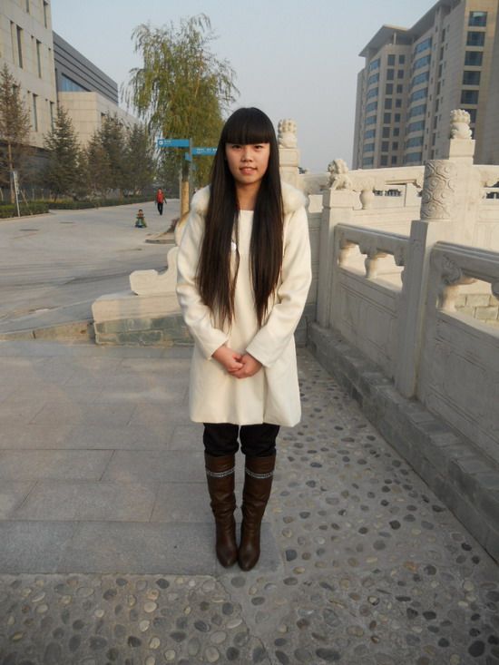 Young girl from Beijing with waist length long hair