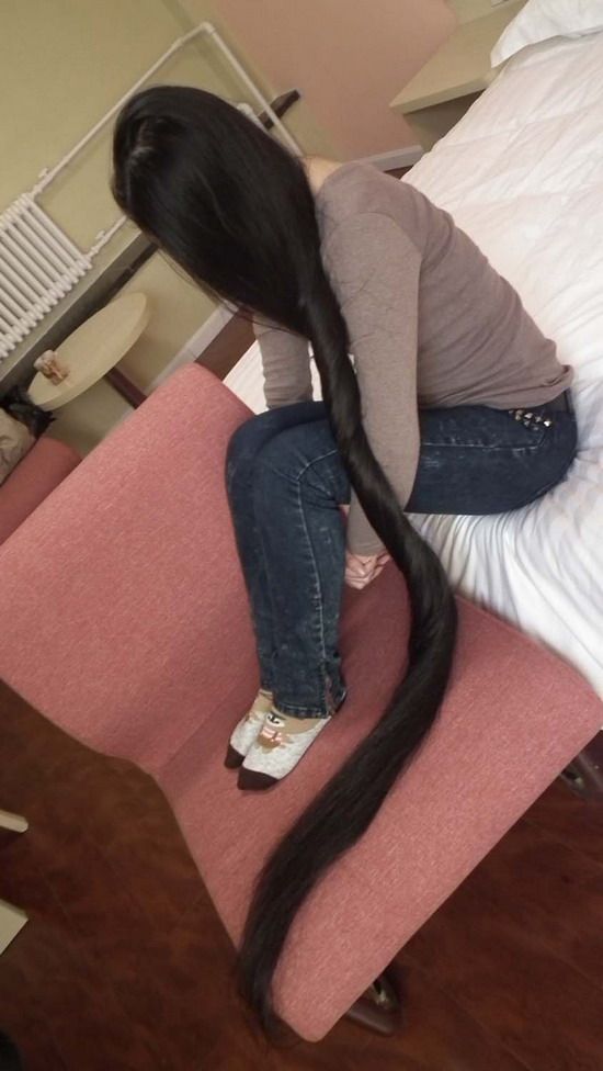 Young girl with 1.5 meters long hair