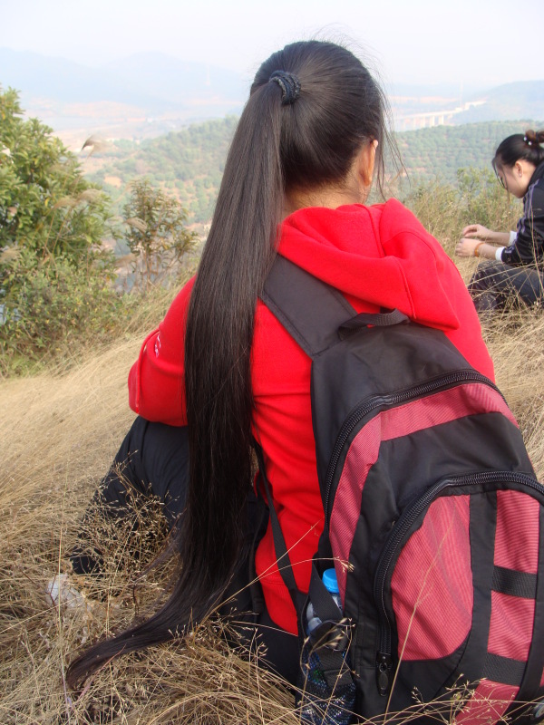 Long hair girl on mountain and railway
