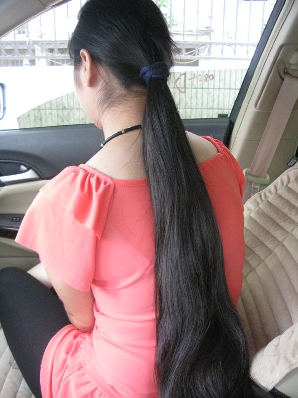 Beautiful girl has 1.3 meters long hair