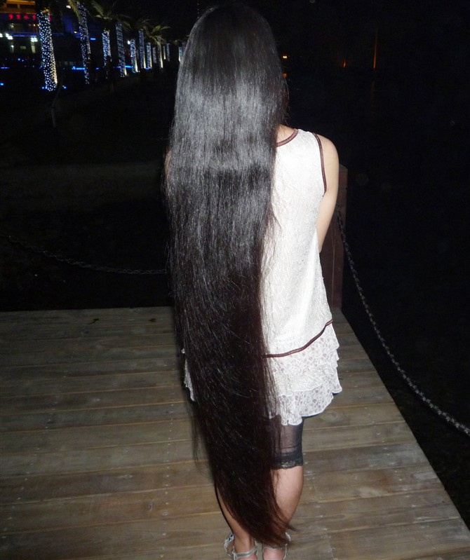 Girl with very beautiful calf length long hair