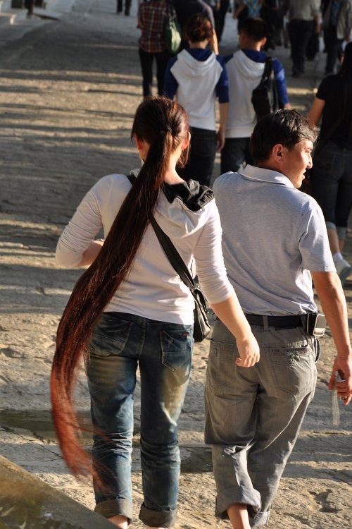 Long ponytail travelled in park