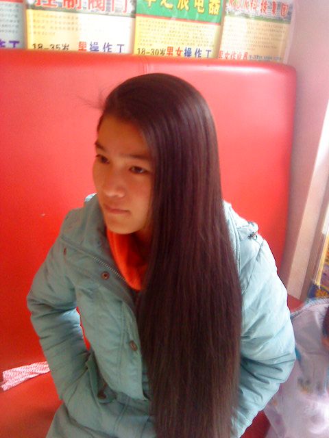 Young girl with silky long hair