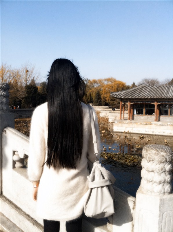 Young girl wanmusha has beautiful waist length long hair