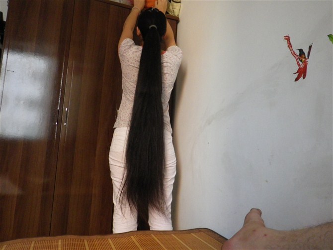 Long hair photo of aner's wife