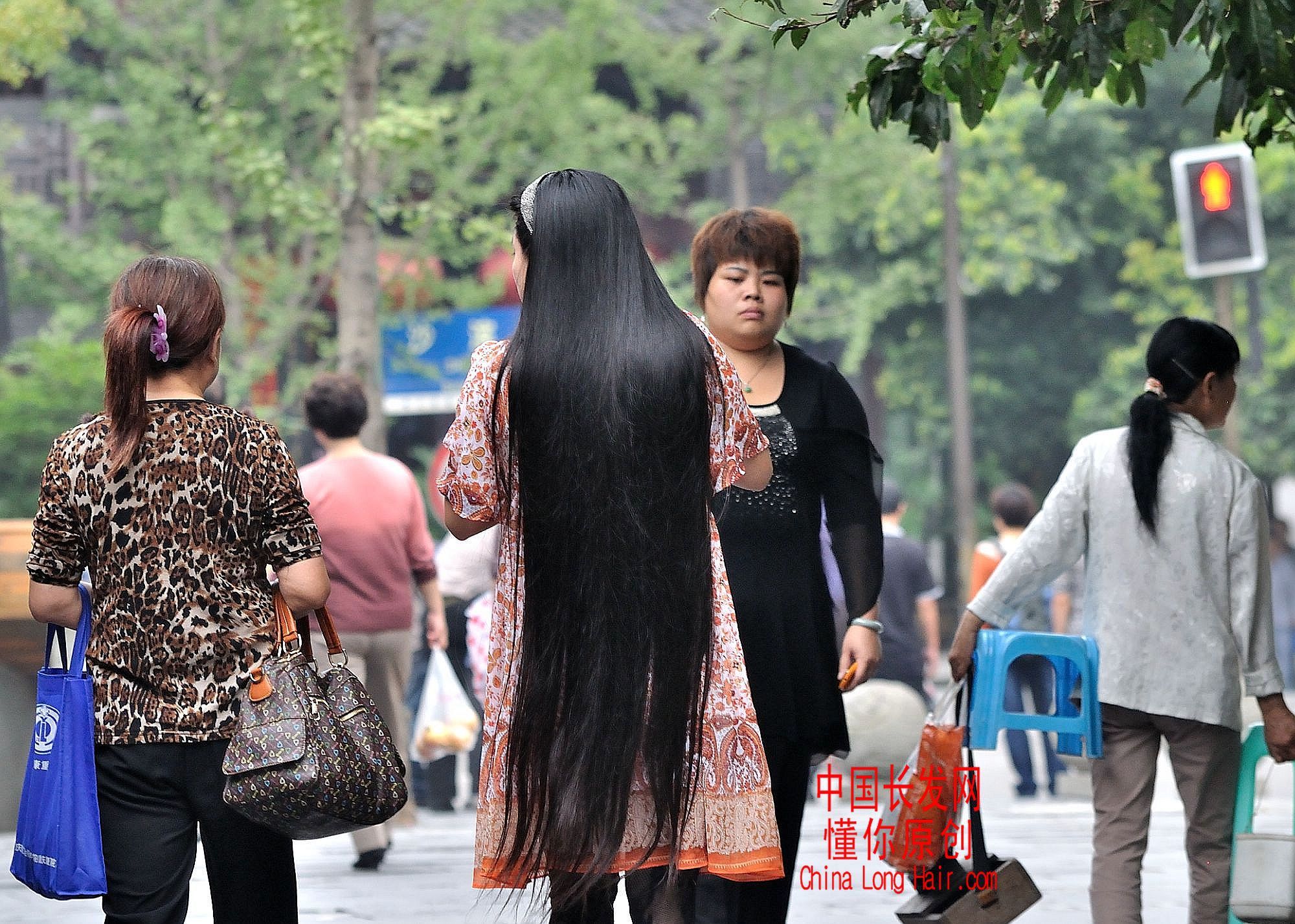 Streetshot of knee length long hair by dongni