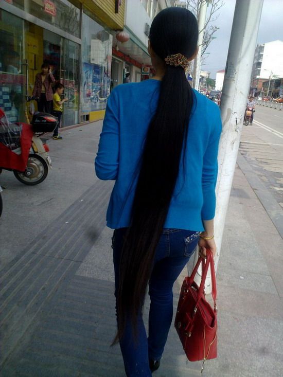 Streetshot of long ponytail by lidunjun