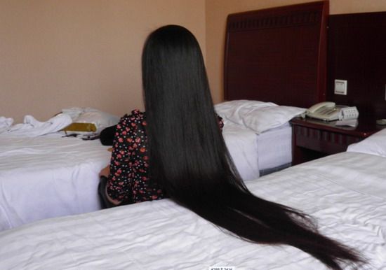 Young girl shishi wash her long hair