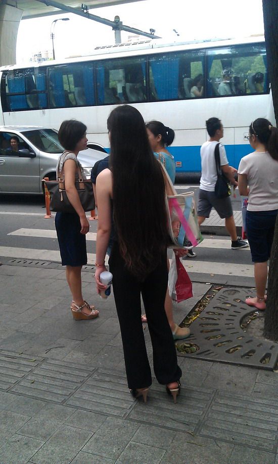 Long hair girl waiting for bus - []