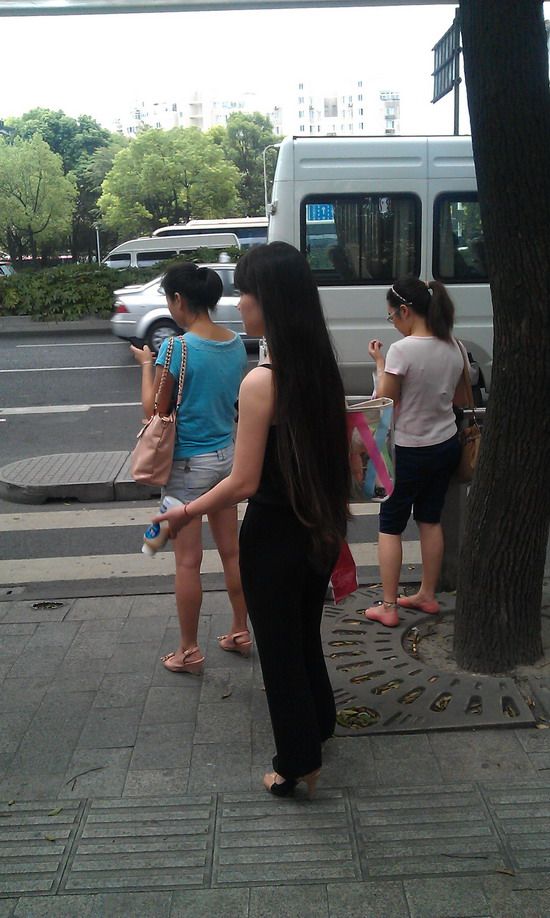 Long hair girl waiting for bus - []