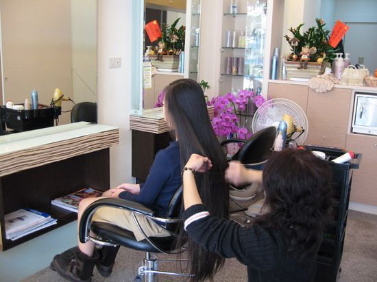 Long hair gril from Taiwan in hair salon for hair care