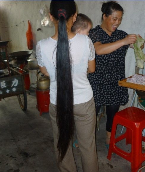 Knee length long hair girl lives in not good condition