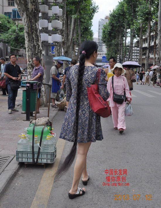 Streetshot of very long braid by dongni in Guiyang