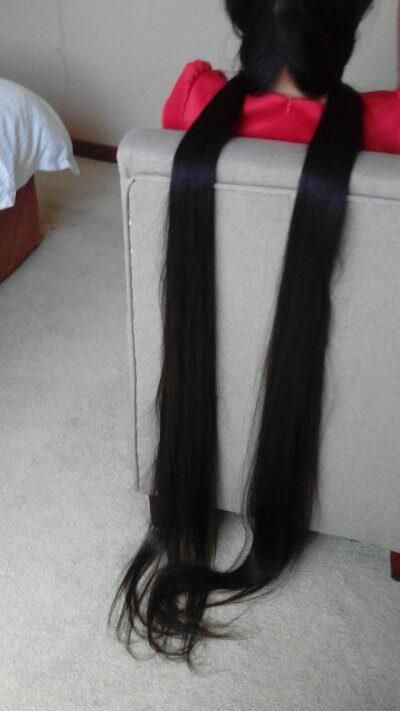 Very long hair lady grovel on table