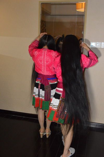 Pan Yongyan and her friend in national traditional clothes