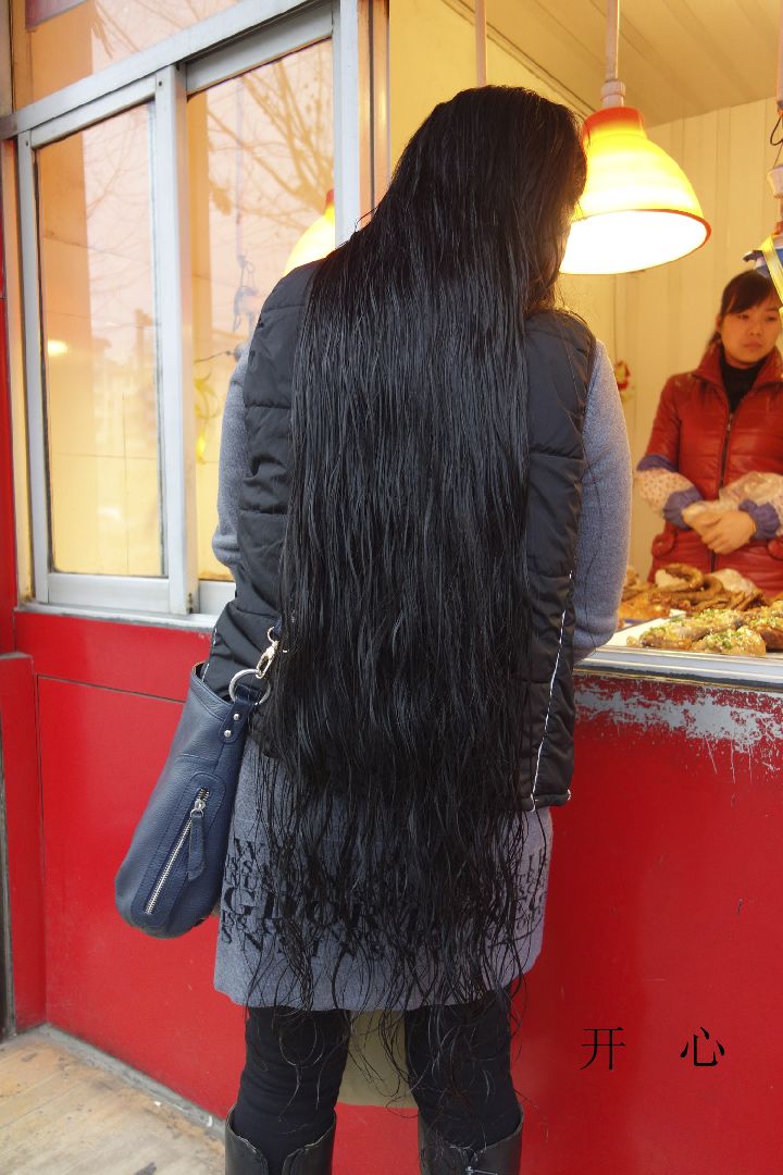 Streetshot of wet long hair by eflikai