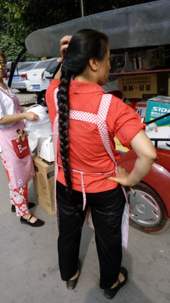 Streetshot of long braid by zhongyuan