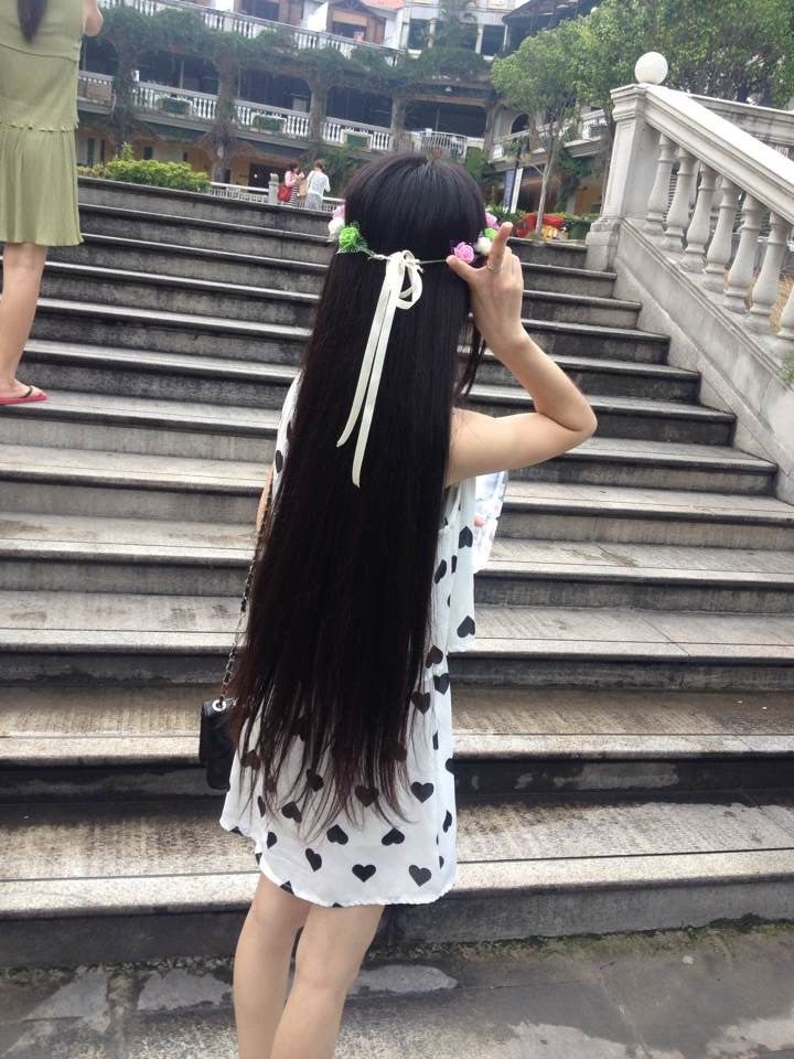 Beautiful long hair girl took photos by herself