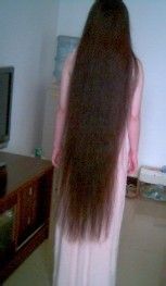 Knee length long hair girl with pink skirt