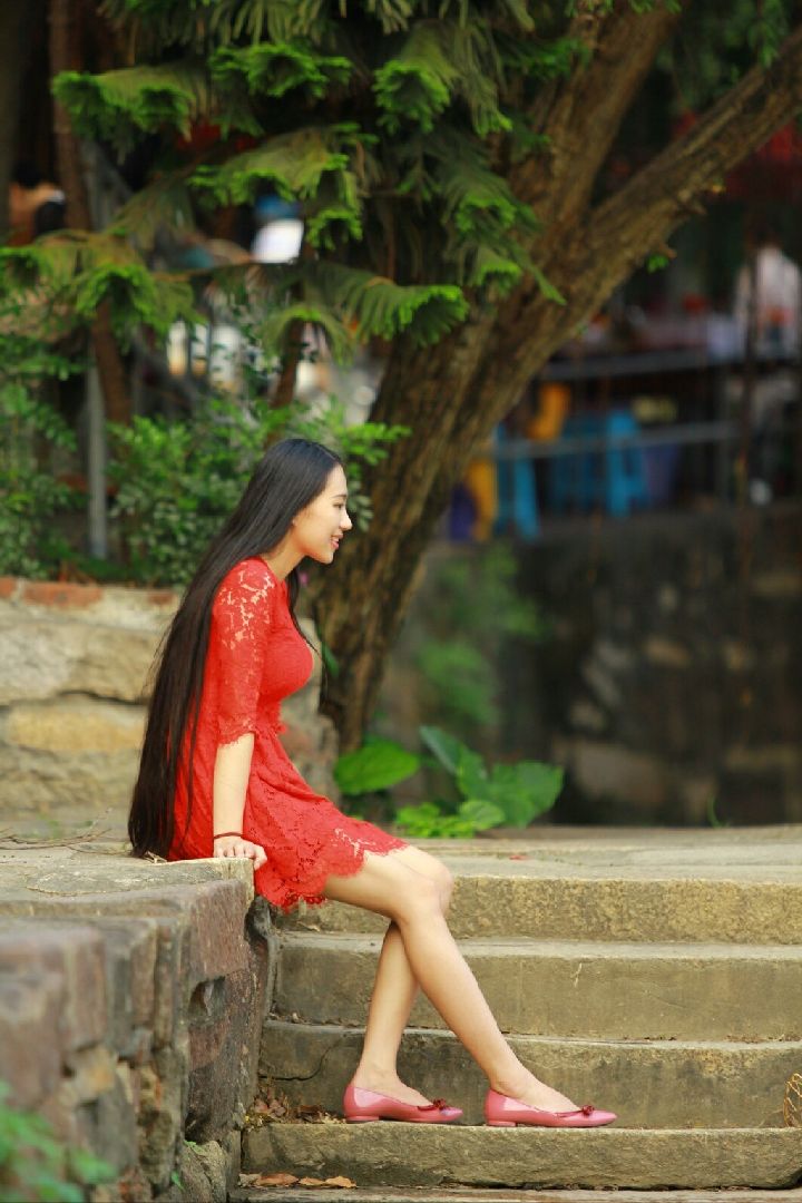 Beautiful long hair girl in red skirt - []