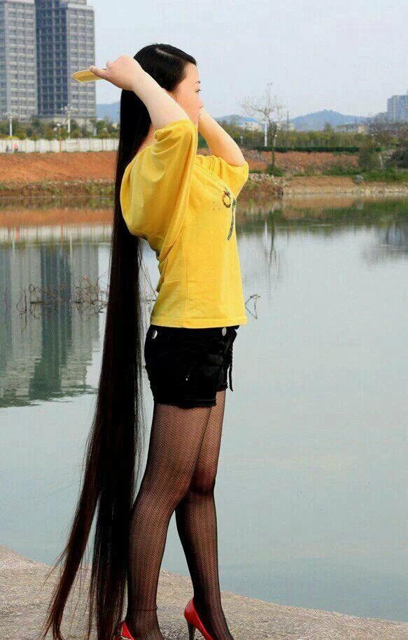 Young girls have floor length long hair