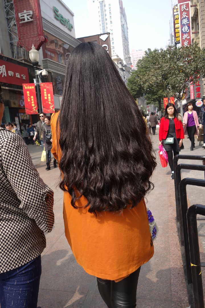 Streetshot of curly long hair by eflikai