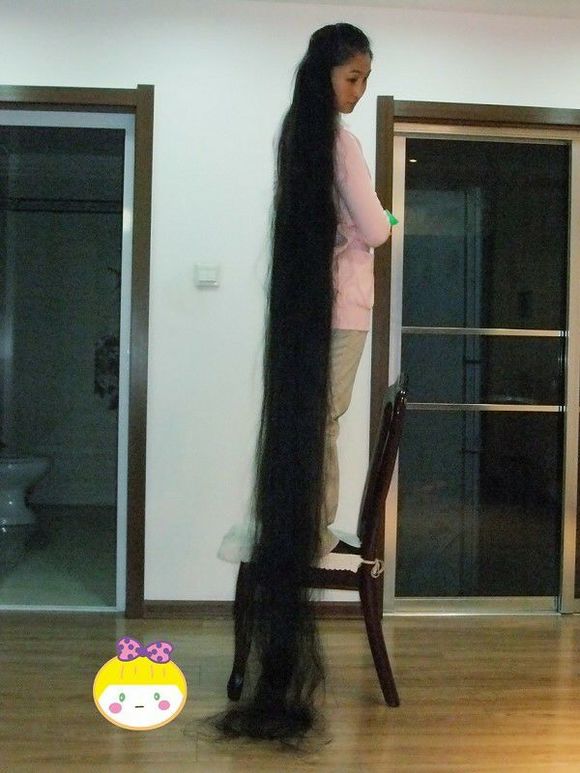 Unknown lady has 2 meters plus long hair