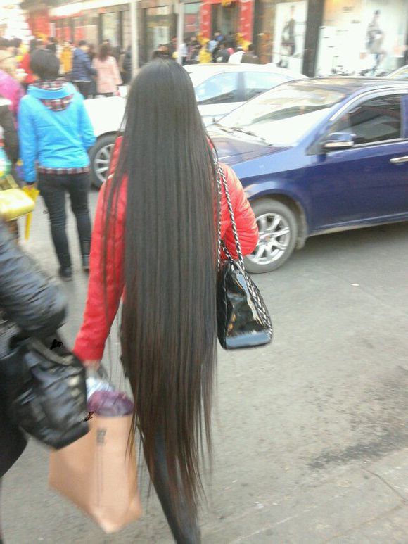 Calf length long hair on street in Shanxi province