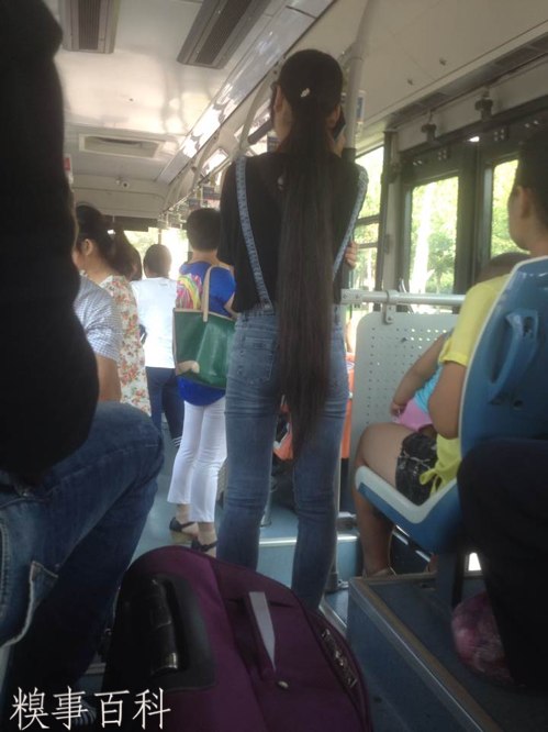 Knee length long hair on bus - []