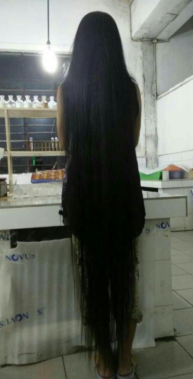 Floor length long hair girl in kitchen