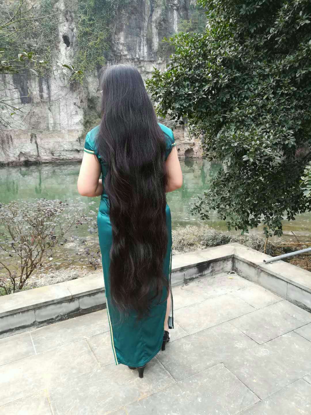 Knee length long hair in park