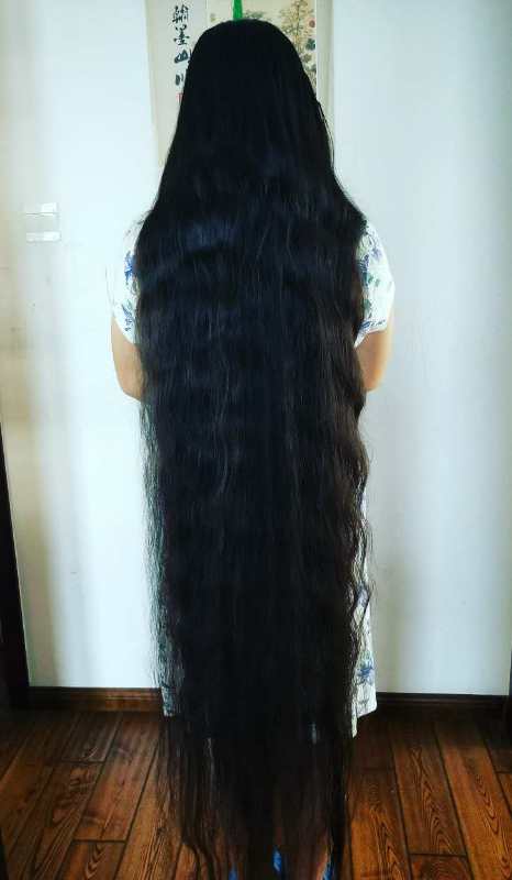 Floor length long hair in room