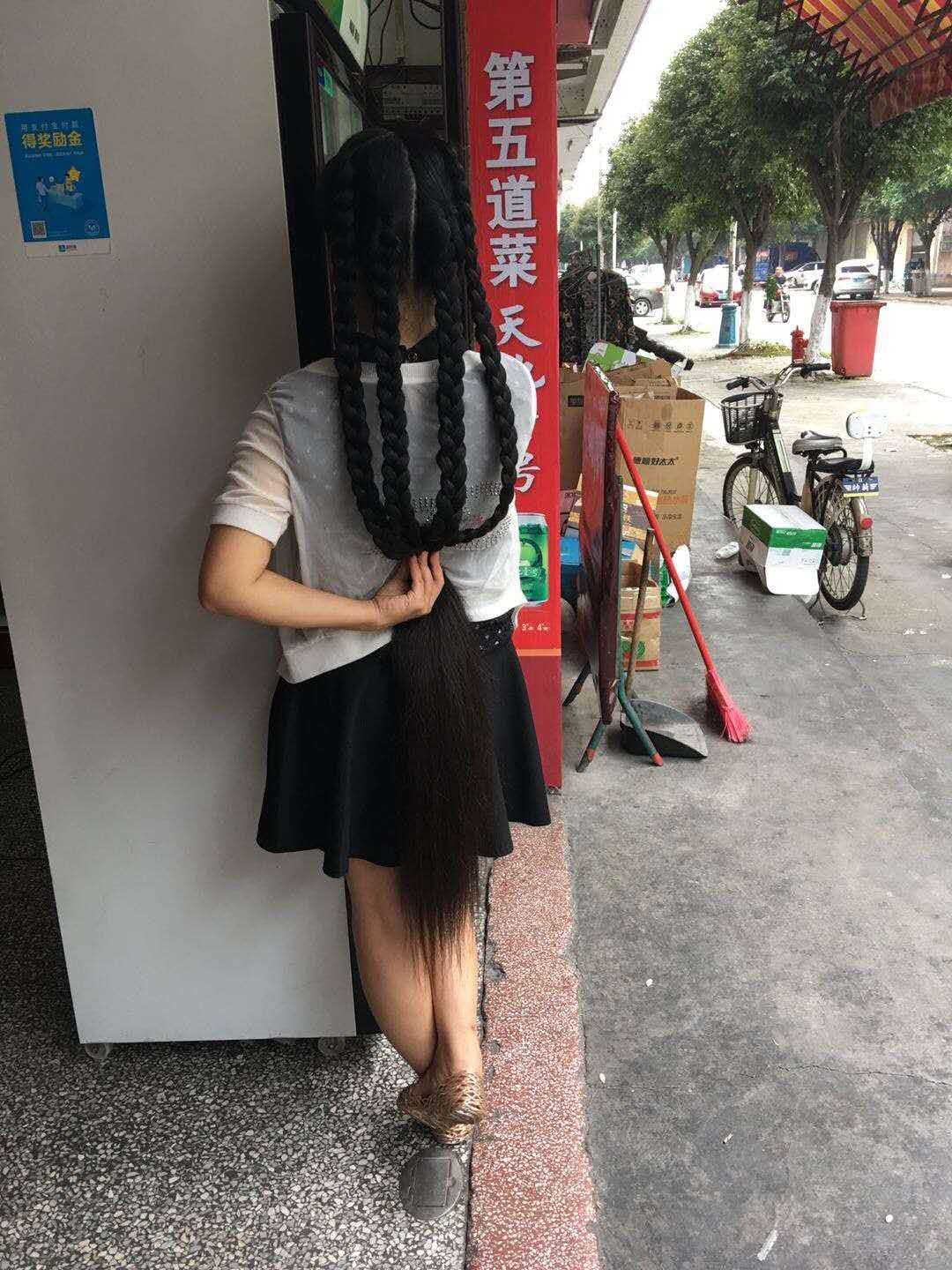 Very thick long hair in 4 braids