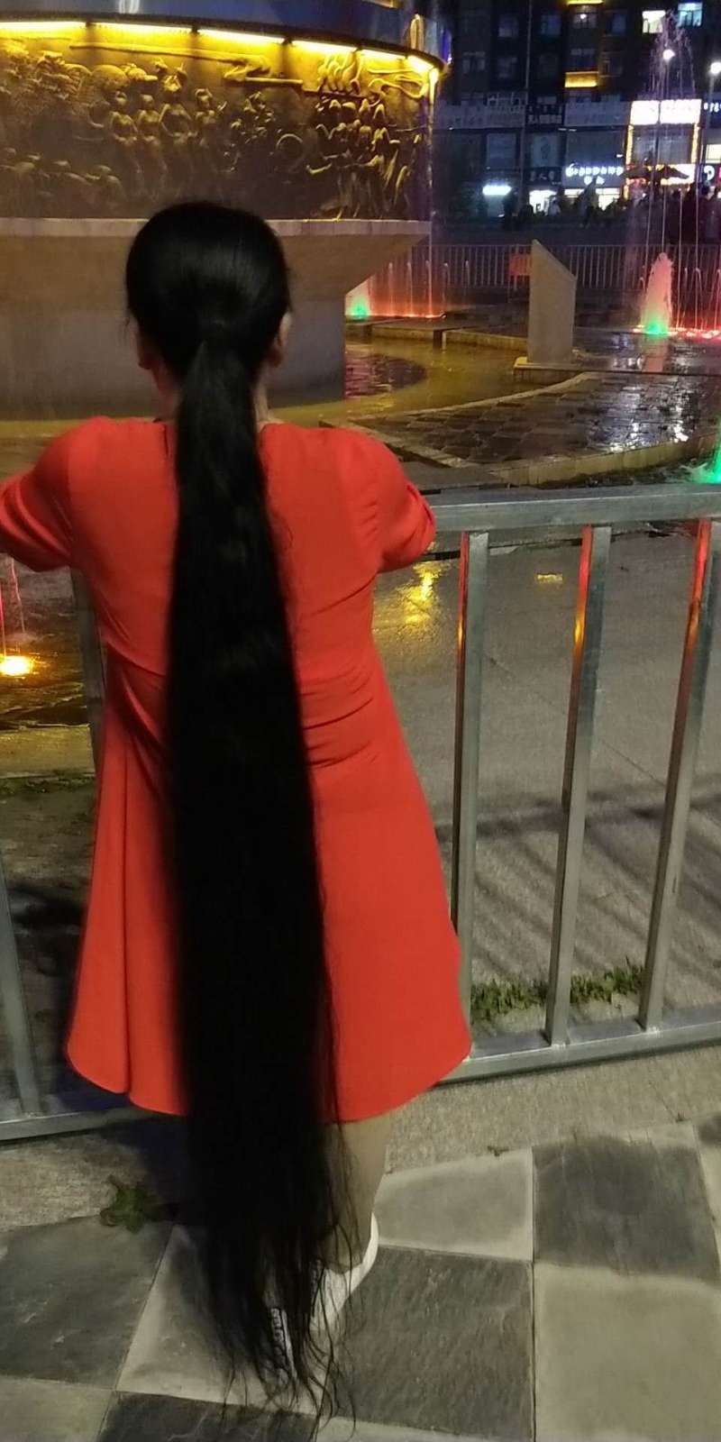 Floor length long hair and ponytail