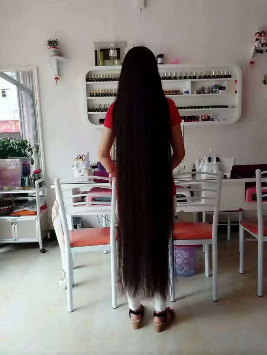 Calf length long hair lady waiting for make up